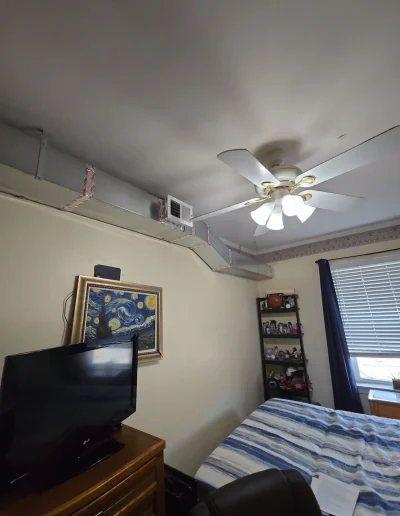 Renovated room with fresh paint and natural lighting